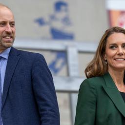 Kate und William lächeln