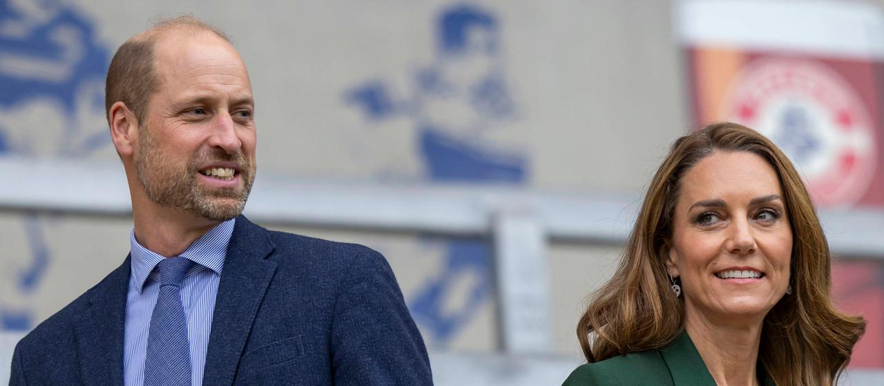 Kate und William lächeln